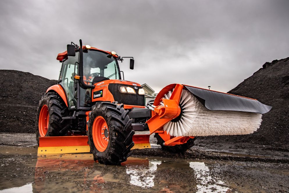 Kubota tractor low down view with broom